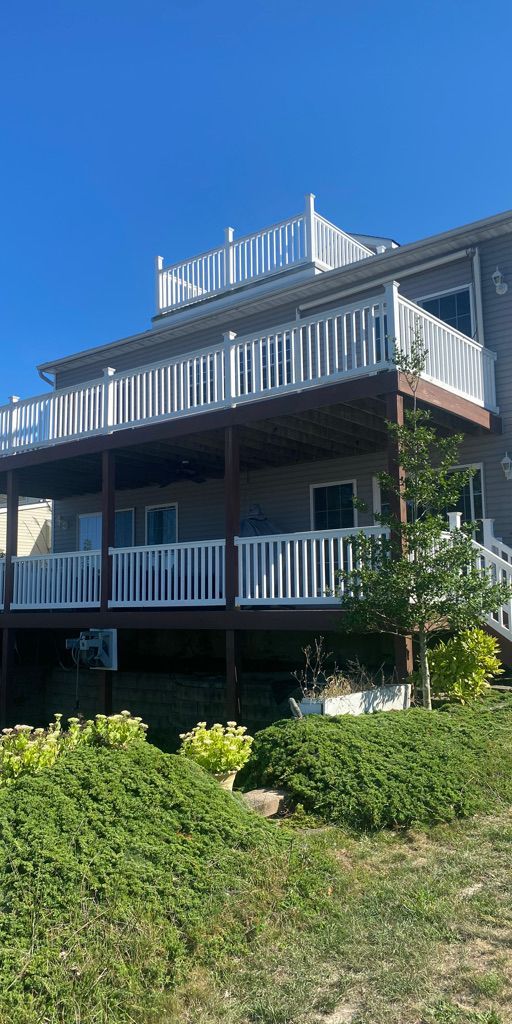 Two-level deck on the back of a shore house