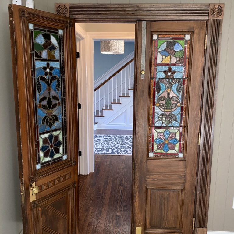 Antique doors with custom door frame built to match and installed by Ziegler Builders